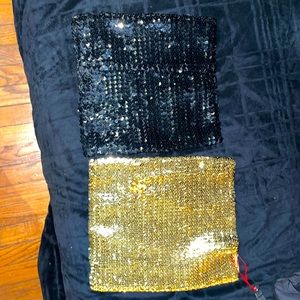 One black and one gold sequence tube tops